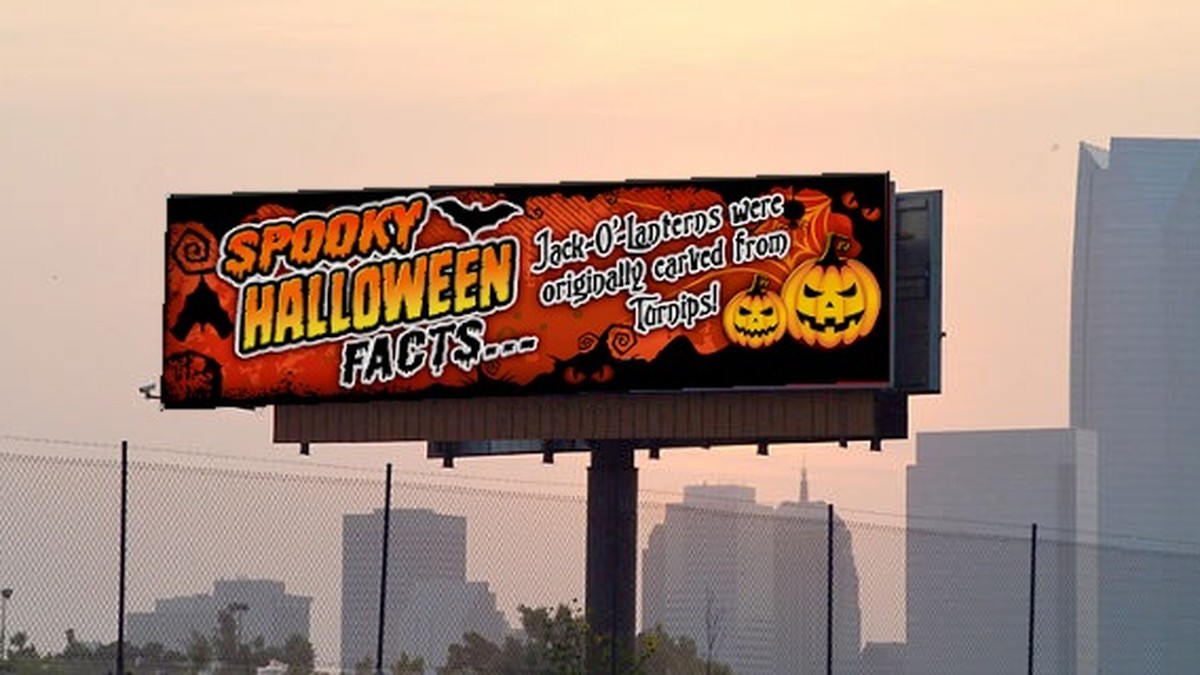 Concept mockup of a Spooky Halloween Facts infotainment creative simulated onto a digital billboard